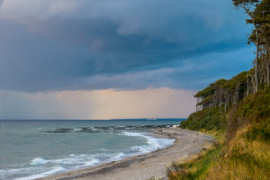 Baltic sea beach with storm clouds in the evening, Nienhagen, Baltic Sea, Western Pomerania, Mecklenburg-Vorpommern, Germany Baltic sea beach with storm clouds in the evening, Nienhagen, Baltic Sea, Western Pomerania, Mecklenburg-Vorpommern, Germany